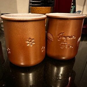 Set of 2 copper-colored La Fermiere glazed ceramic cups.